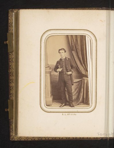 Portrait of a standing young man in naval uniform