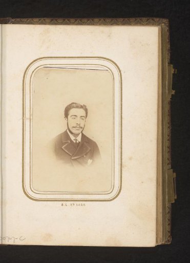 Portrait of a man with a moustache and sideburns