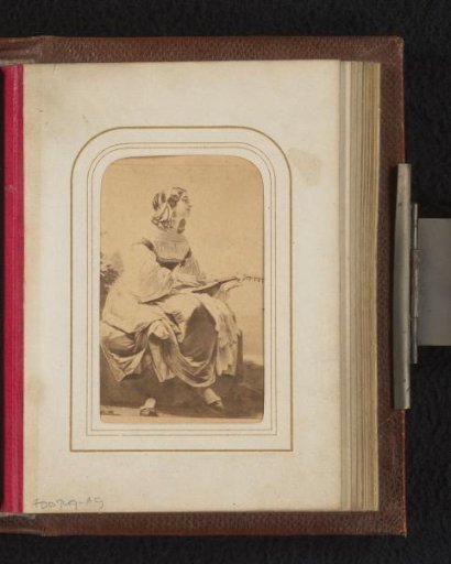 Photographic reproduction of a painting depicting a seated woman with lute