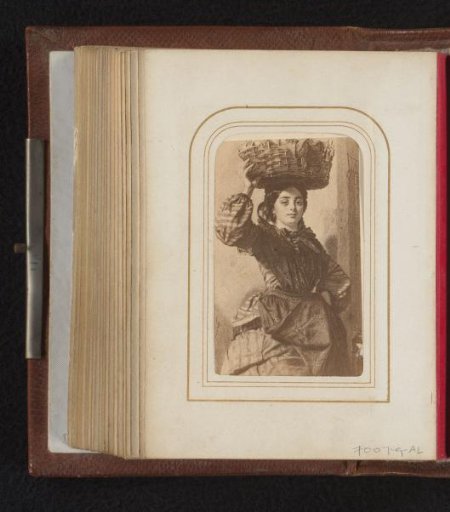 Photographic reproduction of a print after a painting depicting a girl with a basket on her head