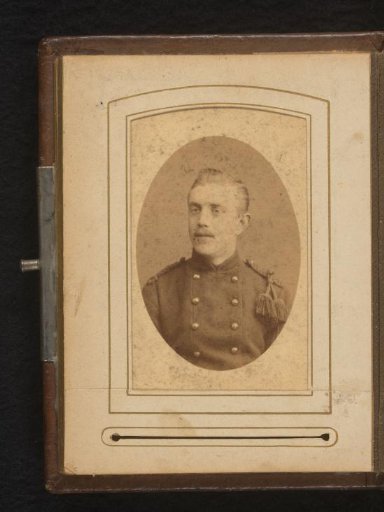 Portrait of a man with a mustache in uniform