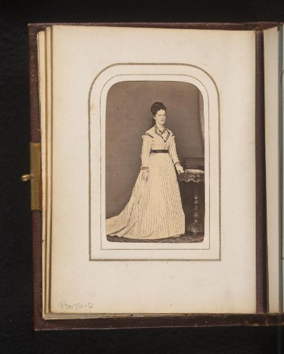 Portrait of a standing woman with necklace