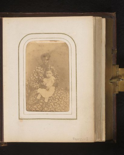 Portrait of a woman with a girl on her lap