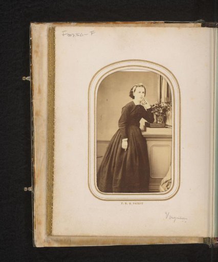 Portrait of a Woman by a Vase with Flowers