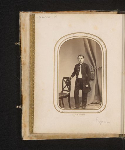 Portrait of a Boy, Standing by a Chair with a Cap