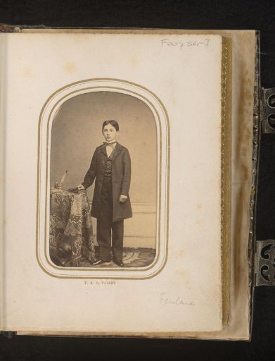 Portrait of a Boy at a Table with Book, Inkwell and Quill