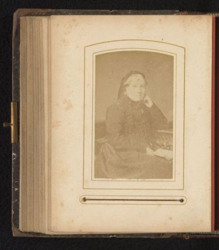 Portrait of a Woman with an Open Book on Her Lap