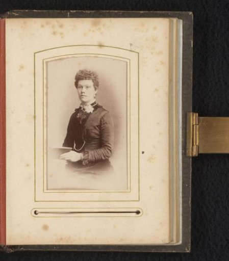 Portrait of a woman with a book in her hand