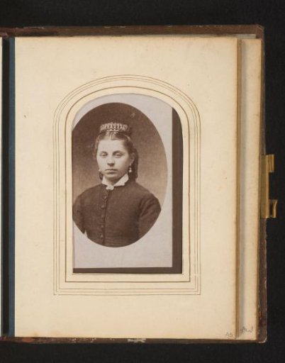 Portrait of a young woman with a headdress