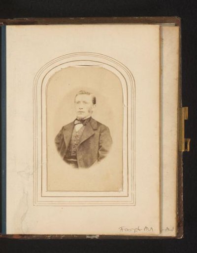 Portrait of a man with beard and bow tie