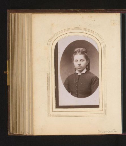 Portrait of a young woman with headgear