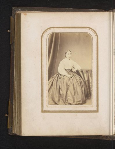 Portrait of a Woman Seated at a Table