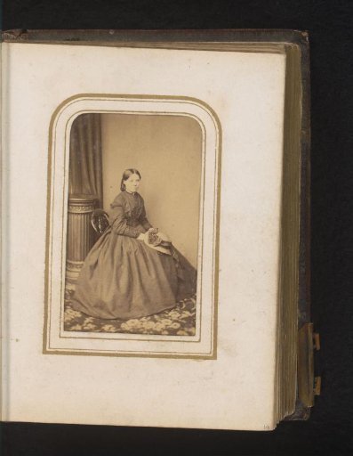 Portrait of a Seated Woman with a Hat in Her Hand