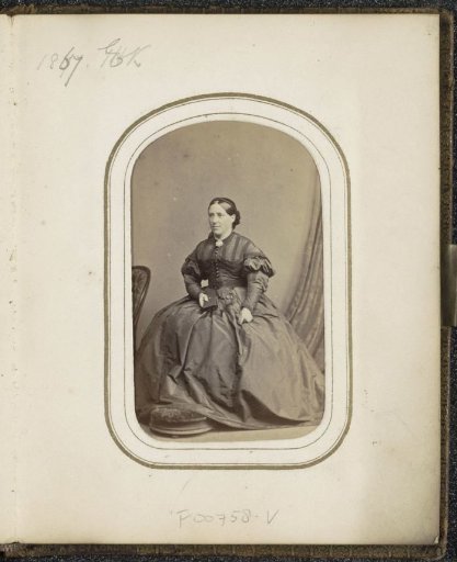 Portrait of a woman with a book in her hand