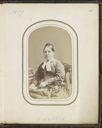 Portrait of a woman with a book in her hand