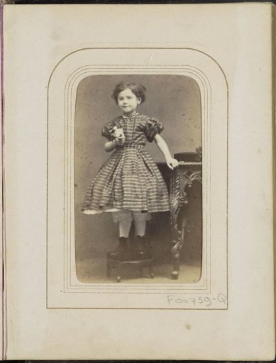 Portrait of a girl at a table