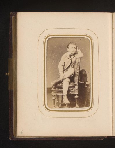 Portrait of a boy sitting on a chair