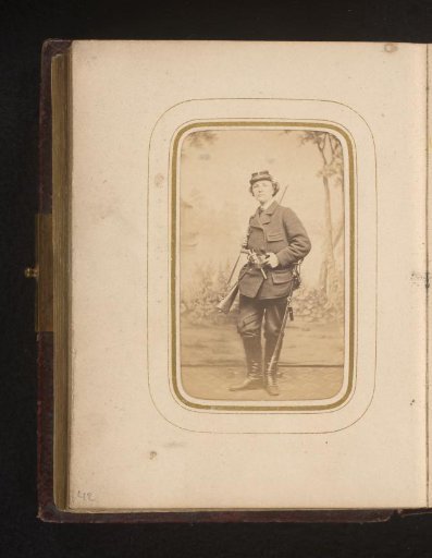 Portrait of a young man with weapons