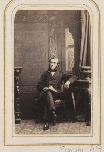 Portrait of a man with a newspaper