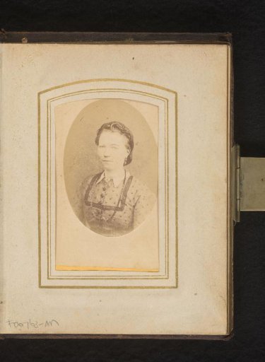 Portrait of a young woman with a necklace