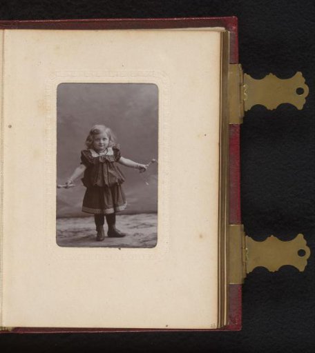 Portrait of a standing girl with a skipping rope