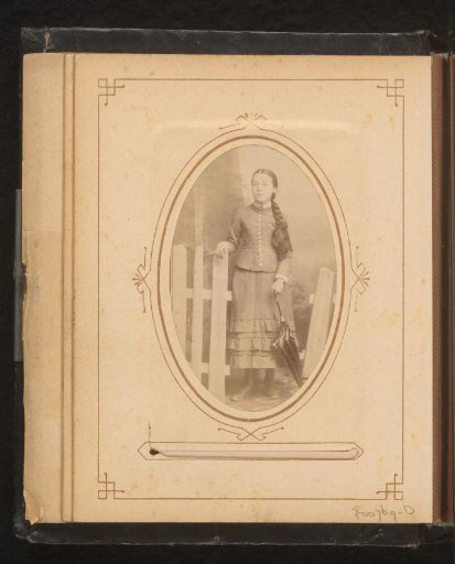 Portrait of a young woman with an umbrella