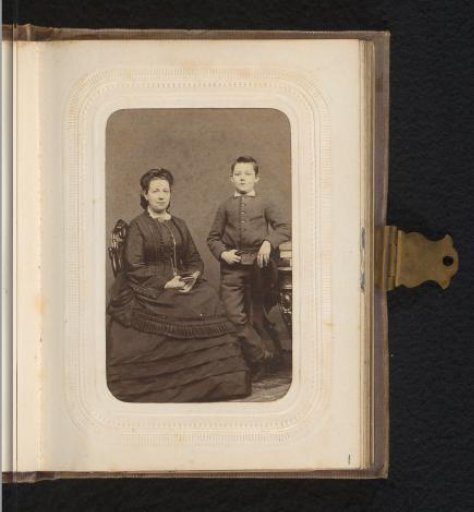 Portrait of a seated woman and a standing boy