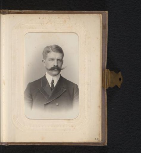 Portrait of a man with a mustache