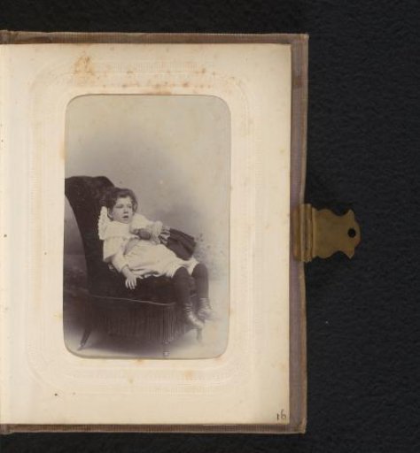 Portrait of a young girl in a chair