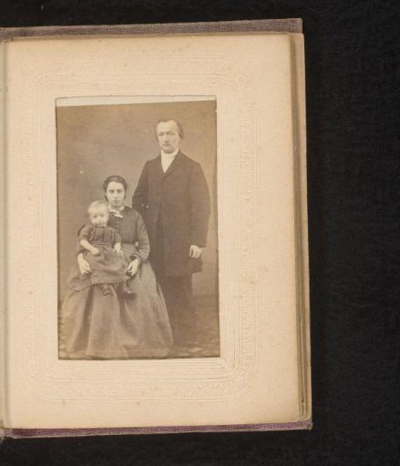 Portrait of a standing man and a seated woman with child on lap, inscribed as A. Mooi and his wife