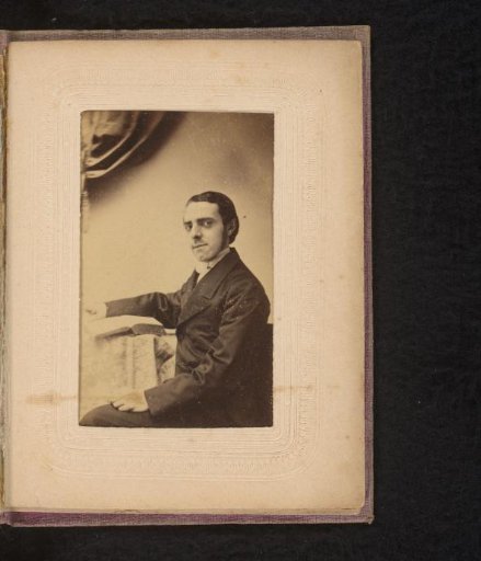 Portrait of a seated man with book, inscribed as Van Hasselt