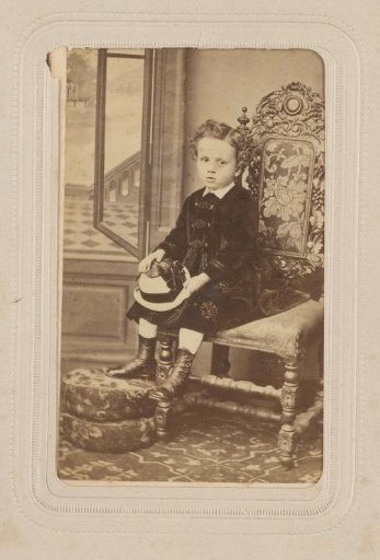 Portrait of a Boy, Seated on a Chair with a Hat on His Knees