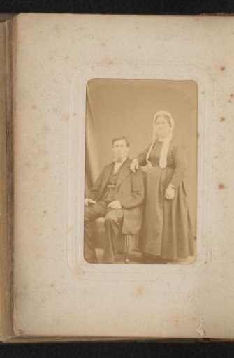 Portrait of a Seated Man and a Standing Woman with a Cap