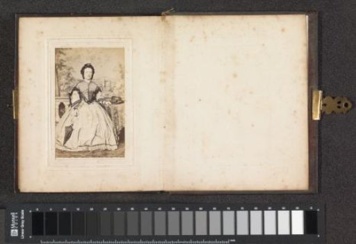 Portrait of a woman with a hat and umbrella, seated