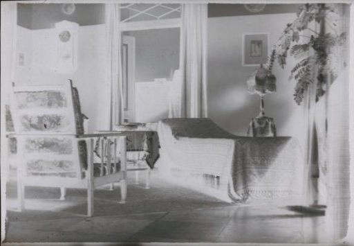 Room with furniture and bed