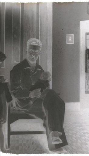 Man with a baby on his lap