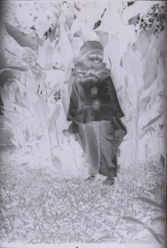 Child designated as 'Pitteke' dressed as a Pierrot