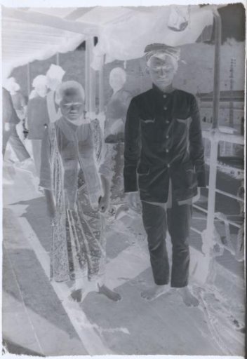 Indonesian man and woman designated as 'Ojo en Baboe' aboard the ss. Sloet