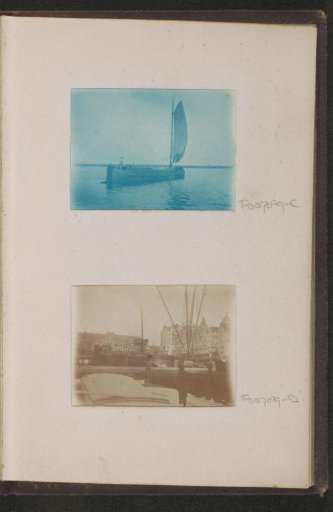 Boats on the Damrak in Amsterdam