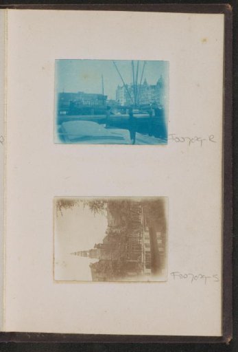 Boats on the Damrak in Amsterdam