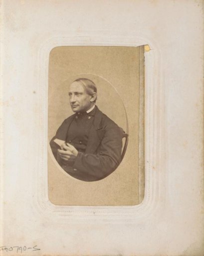 Portrait of (presumably) a cleric seated with a book in his hands