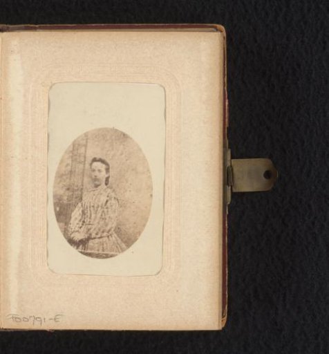 Portrait of a standing young woman
