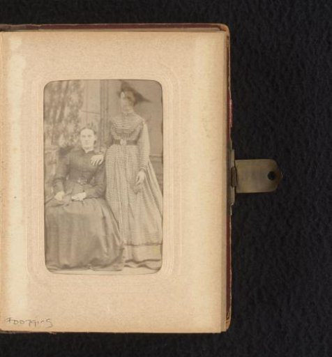 Portrait of a seated and a standing young woman