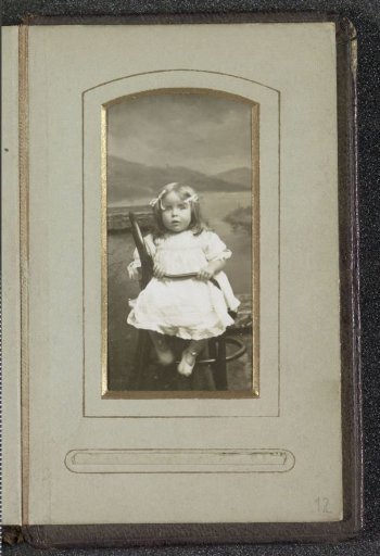 Portrait of a young girl in a dress