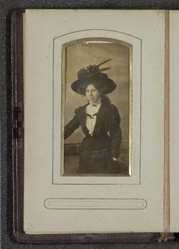 Portrait of a young woman with a hat