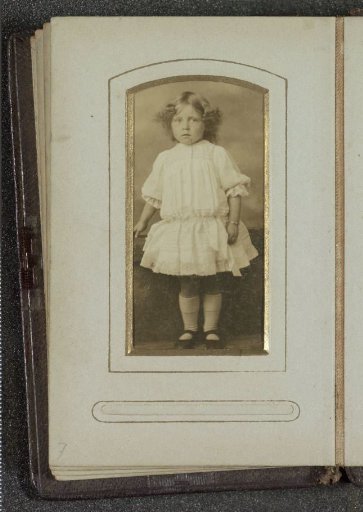 Portrait of a young girl in a dress
