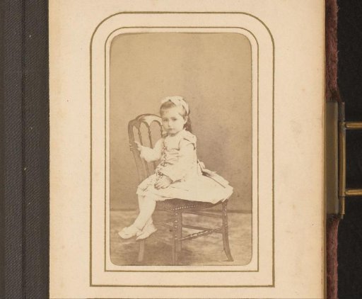 Portrait of a Girl Sitting on a Chair