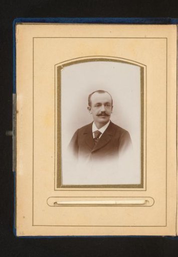 Portrait of a man with a moustache and a cravat