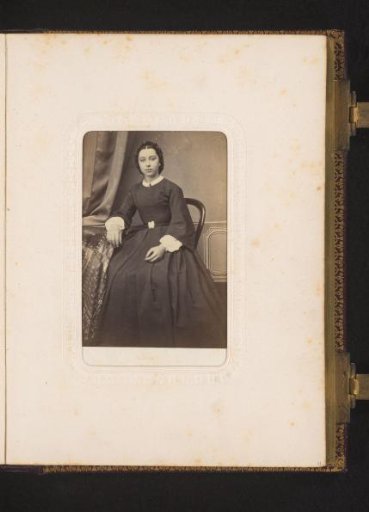 Portrait of a Young Woman, Seated at a Table