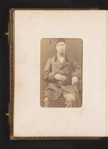 Portrait of a Seated Man with Hat and Coat